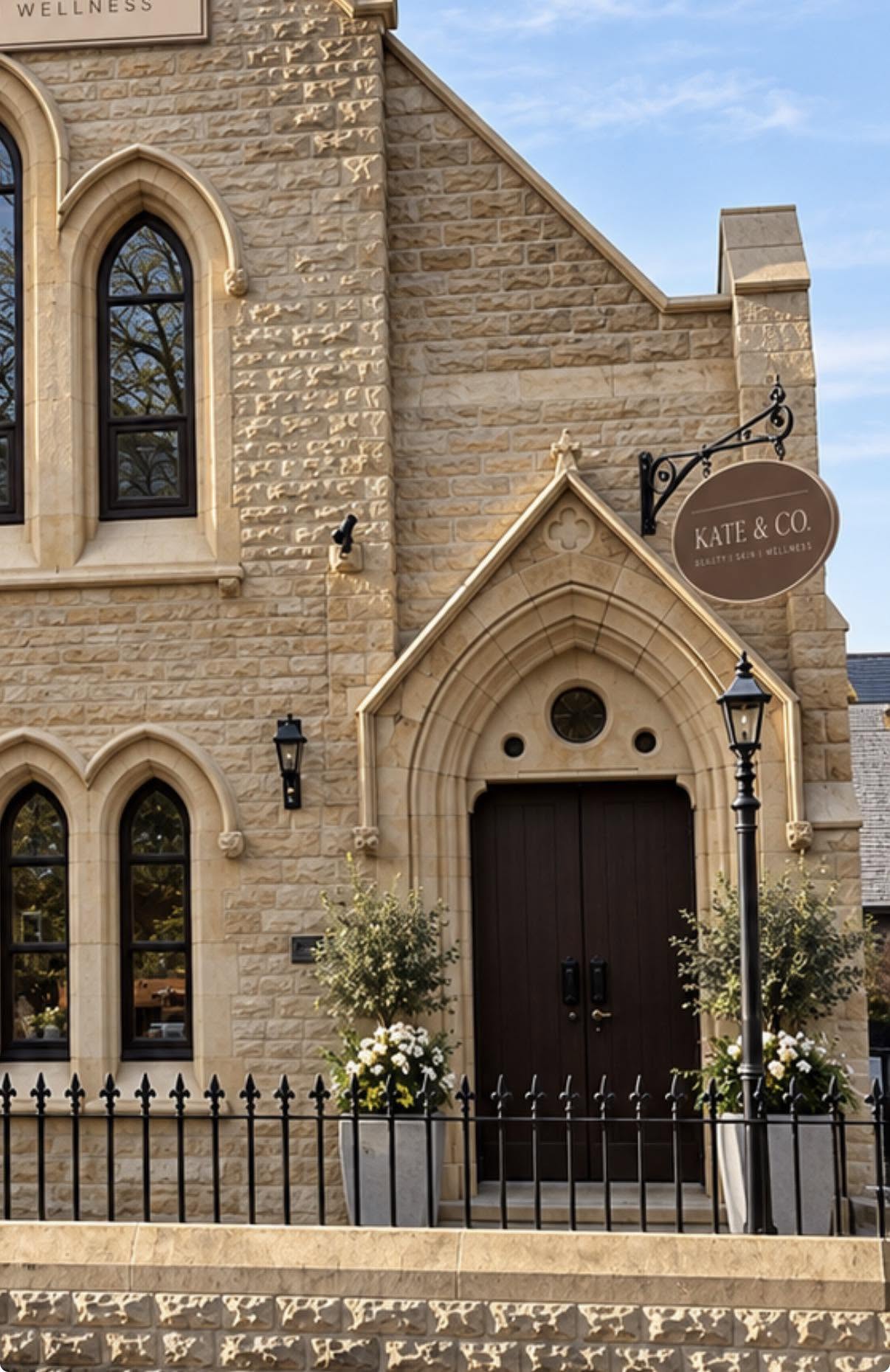 The Kate & Co. clinic in Longridge, a converted stone building lit at dusk
